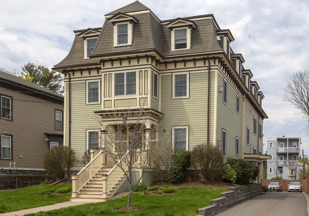 96 Dix Street, Unit 2 Boston, MA 02122 - Photo 1 of 11 a front view of a house with a yard