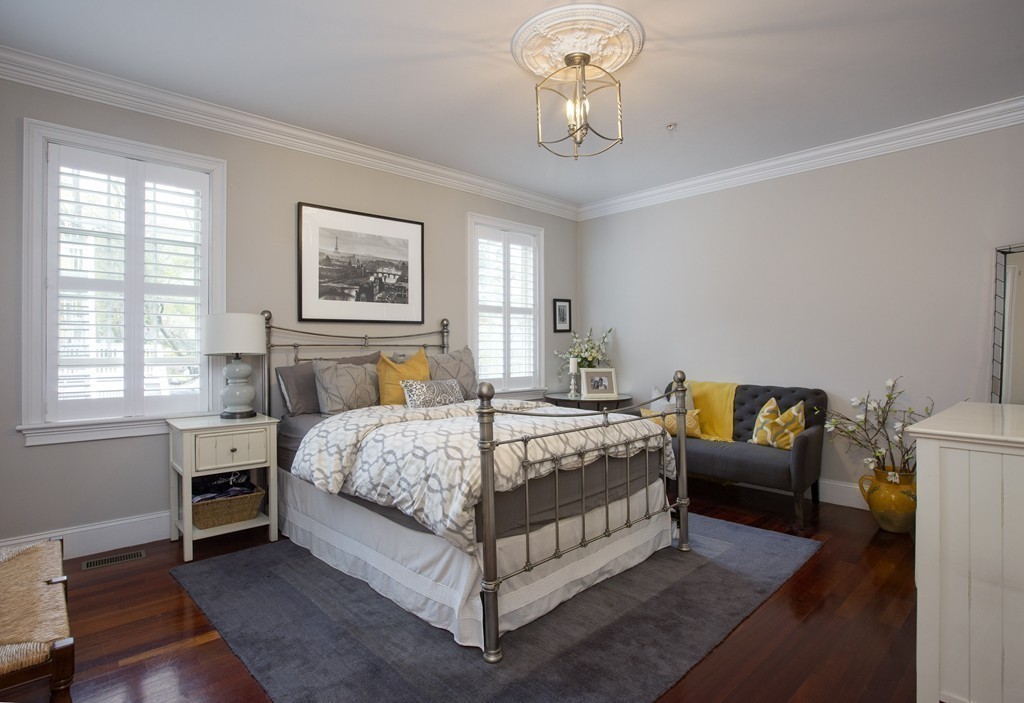 96 Dix Street, Unit 2 Boston, MA 02122 - Photo 6 of 11 a bedroom with a bed and window