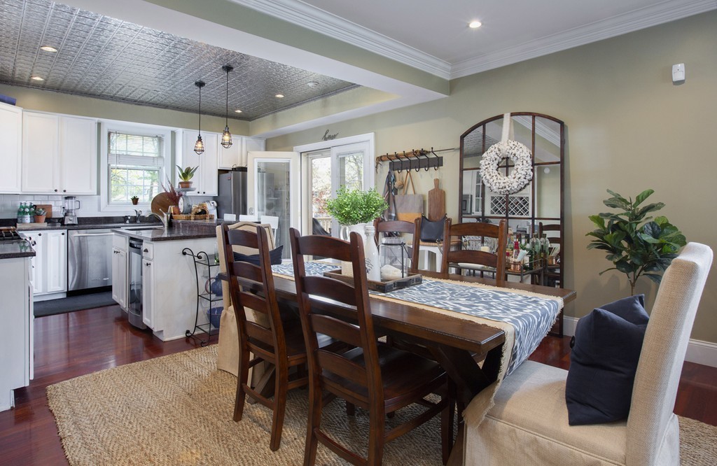 96 Dix Street, Unit 2 Boston, MA 02122 - Photo 10 of 11 a view of a dining room with furniture and wooden floor