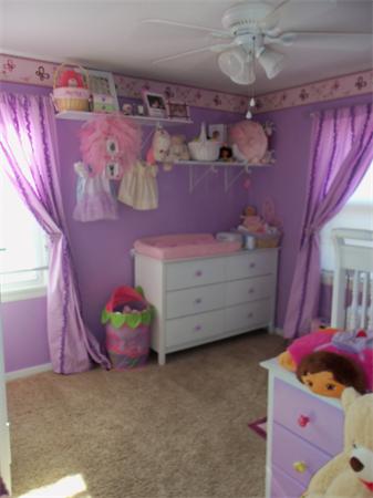 10 Canterbury Road Springfield, MA 01118 - Photo 12 of 15 a bed room with a bed and a window