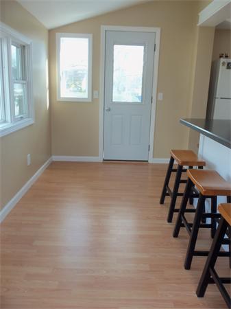 10 Canterbury Road Springfield, MA 01118 - Photo 7 of 15 wooden floor in an empty room with a window