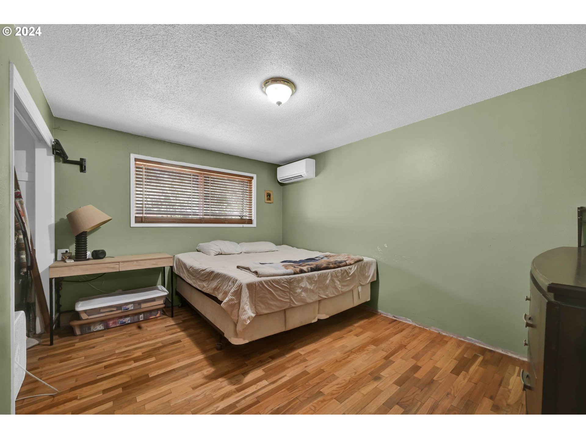2301 Compton Street Eugene, OR 97404 - Photo 16 of 27 a bedroom with a bed and a window
