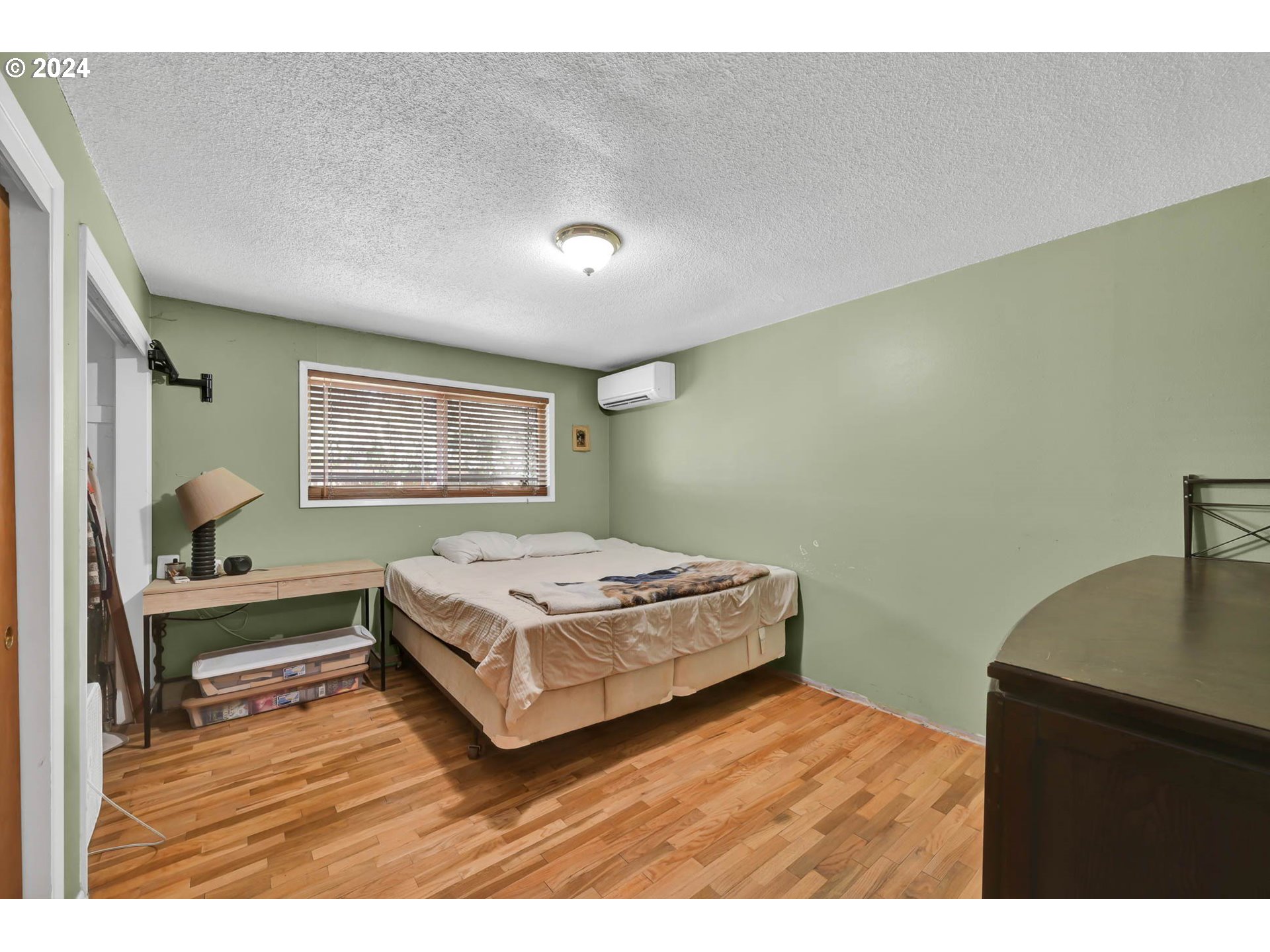2301 Compton Street Eugene, OR 97404 - Photo 18 of 27 a bedroom with a bed and a desk