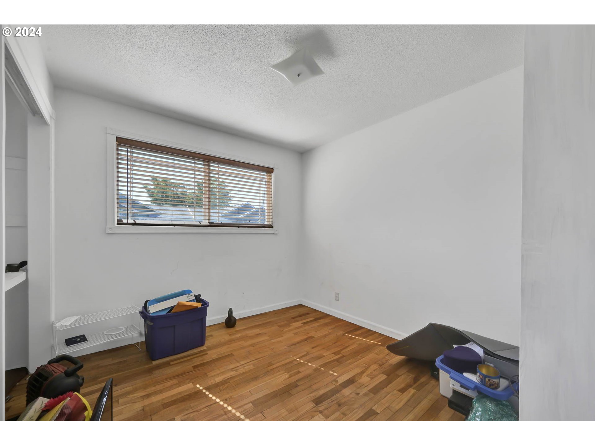 2301 Compton Street Eugene, OR 97404 - Photo 20 of 27 a view of an empty room with a window