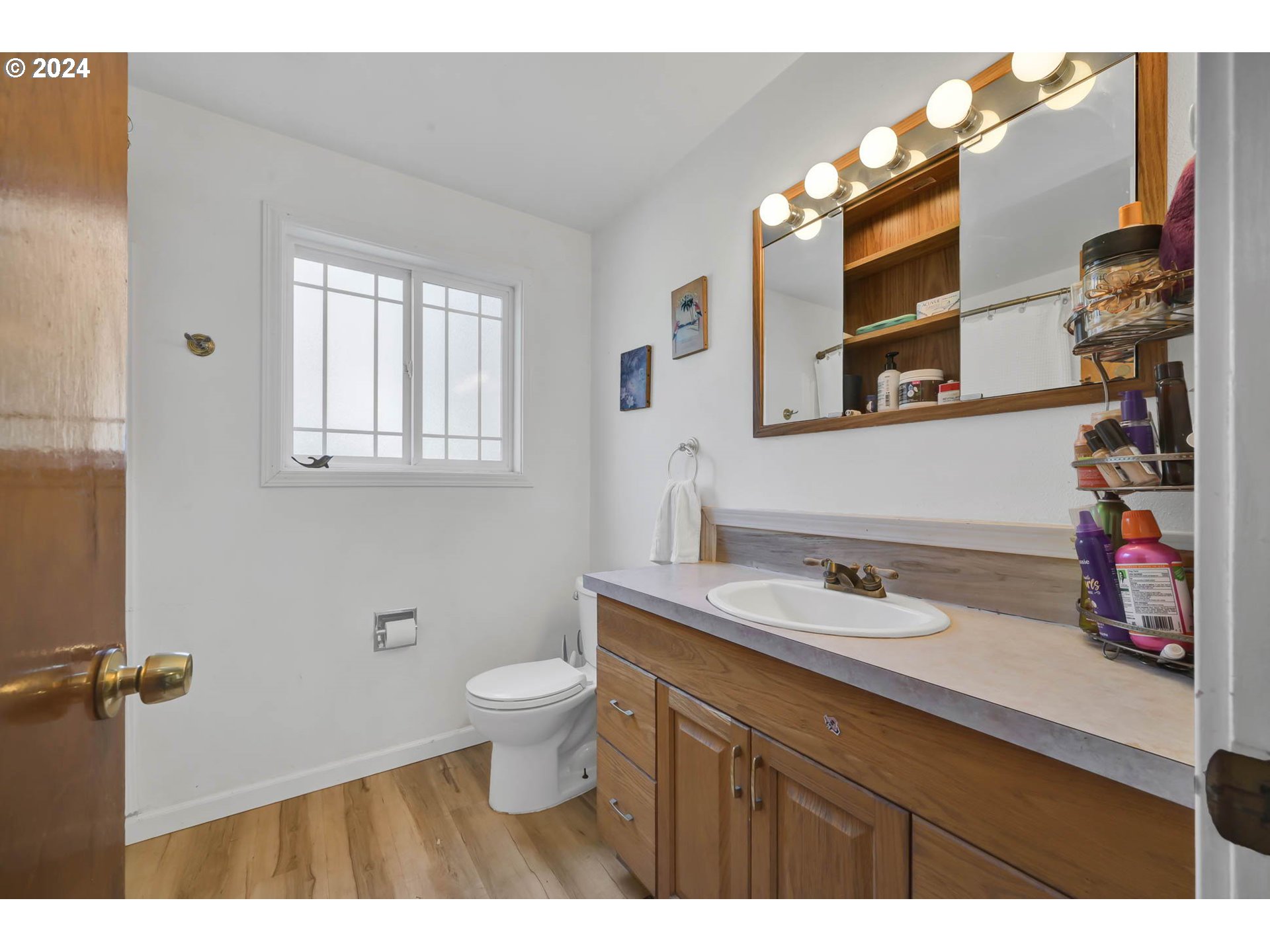 2301 Compton Street Eugene, OR 97404 - Photo 21 of 27 a bathroom with a sink vanity granite and a toilet