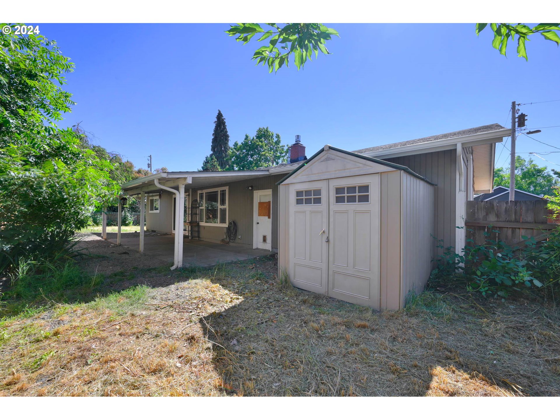 2301 Compton Street Eugene, OR 97404 - Photo 25 of 27 a view of a house with a yard