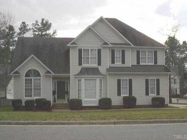 11933 Radner Way Raleigh, NC 27613 - Photo 1 of 1 a front view of a house with a garden