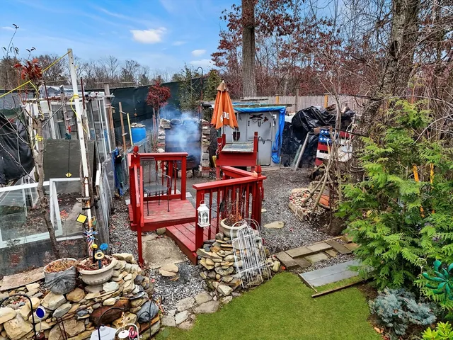 a view of a chairs and tables in patio