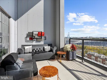 a kitchen with stainless steel appliances a refrigerator and a stove