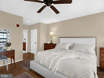a bathroom with a bathtub and a shower curtain