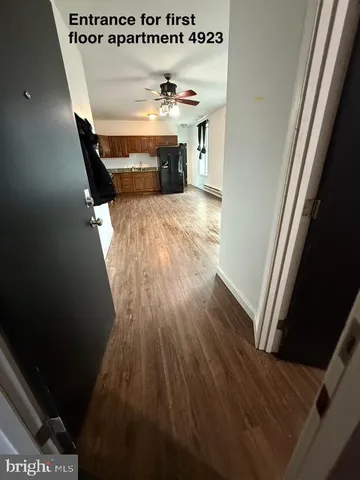 a picture of a room with wooden floor