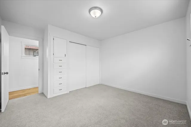 an empty room with cabinet