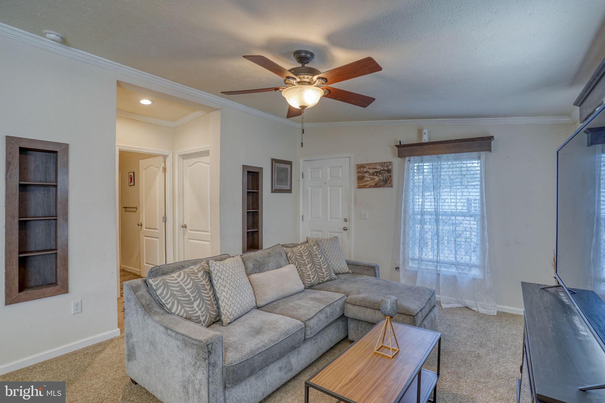 413 4th Street Frederica, DE 19946 - Photo 15 of 31 a living room with furniture and a window