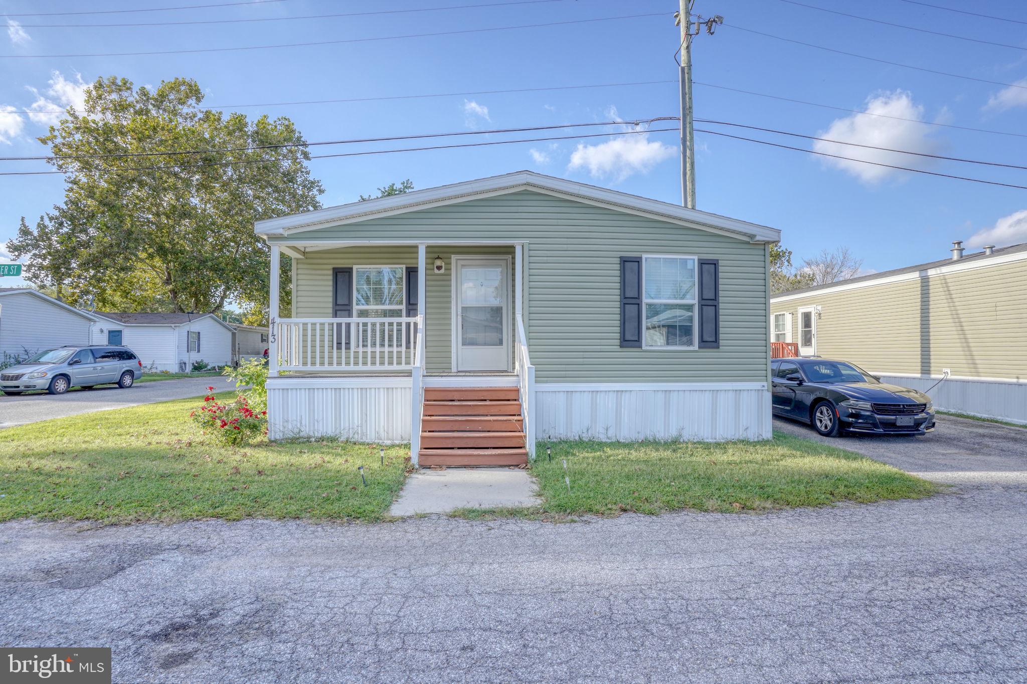 413 4th Street Frederica, DE 19946 - Photo 2 of 31 a view of a house with a back yard