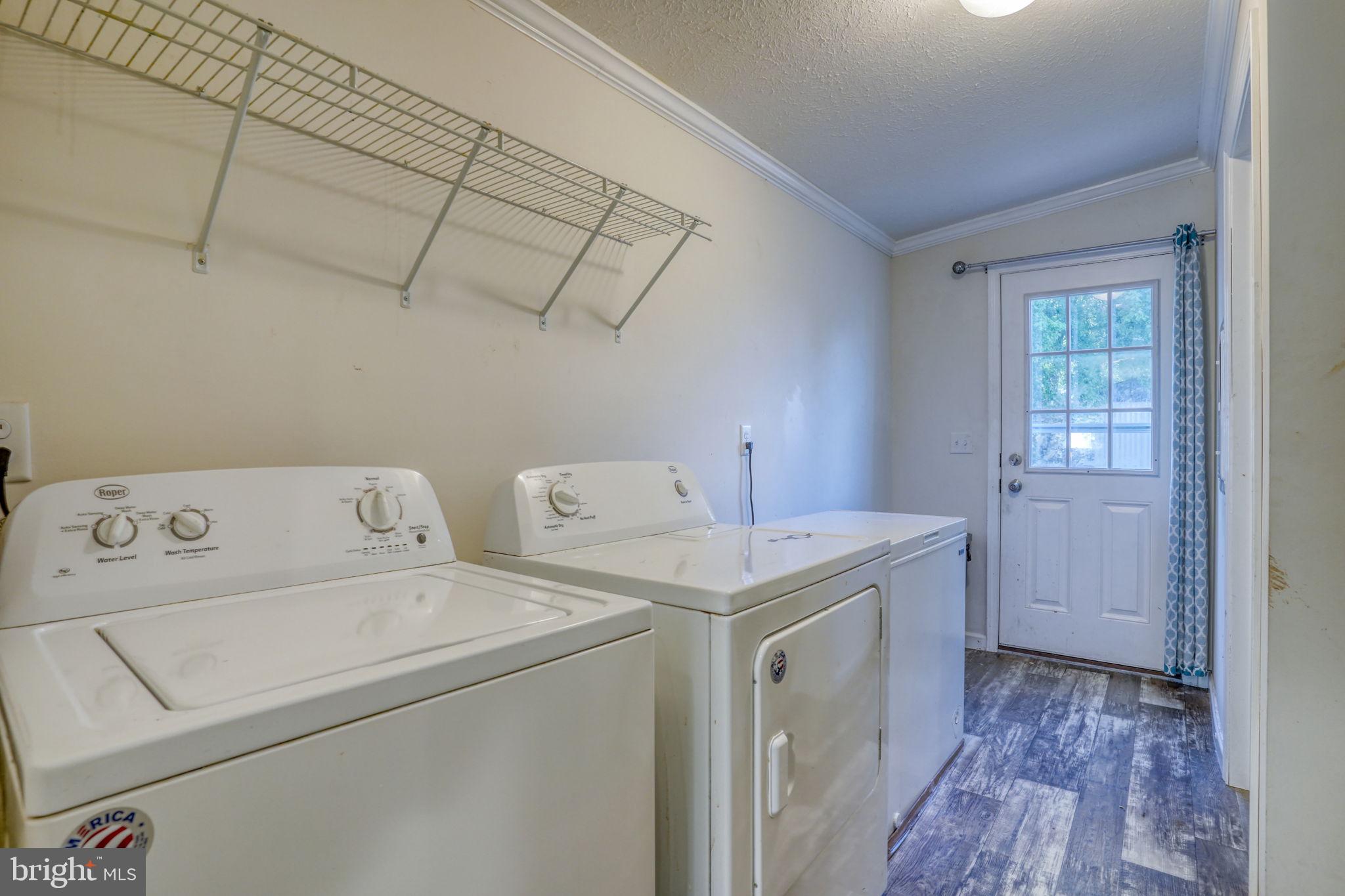 413 4th Street Frederica, DE 19946 - Photo 27 of 31 a utility room with dryer and washer