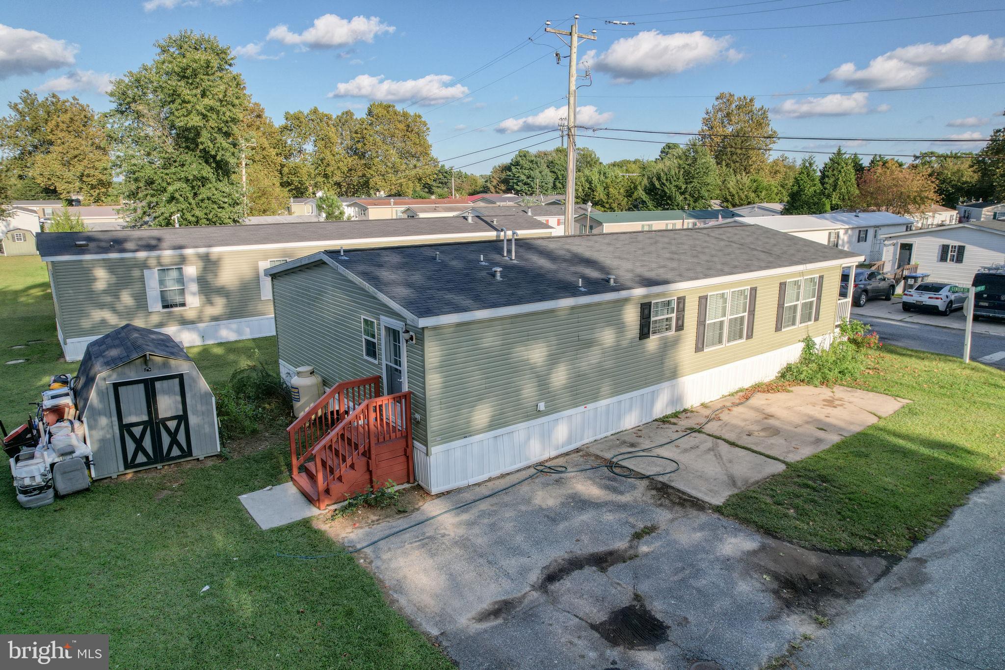 413 4th Street Frederica, DE 19946 - Photo 31 of 31 a view of a house with backyard and sitting area