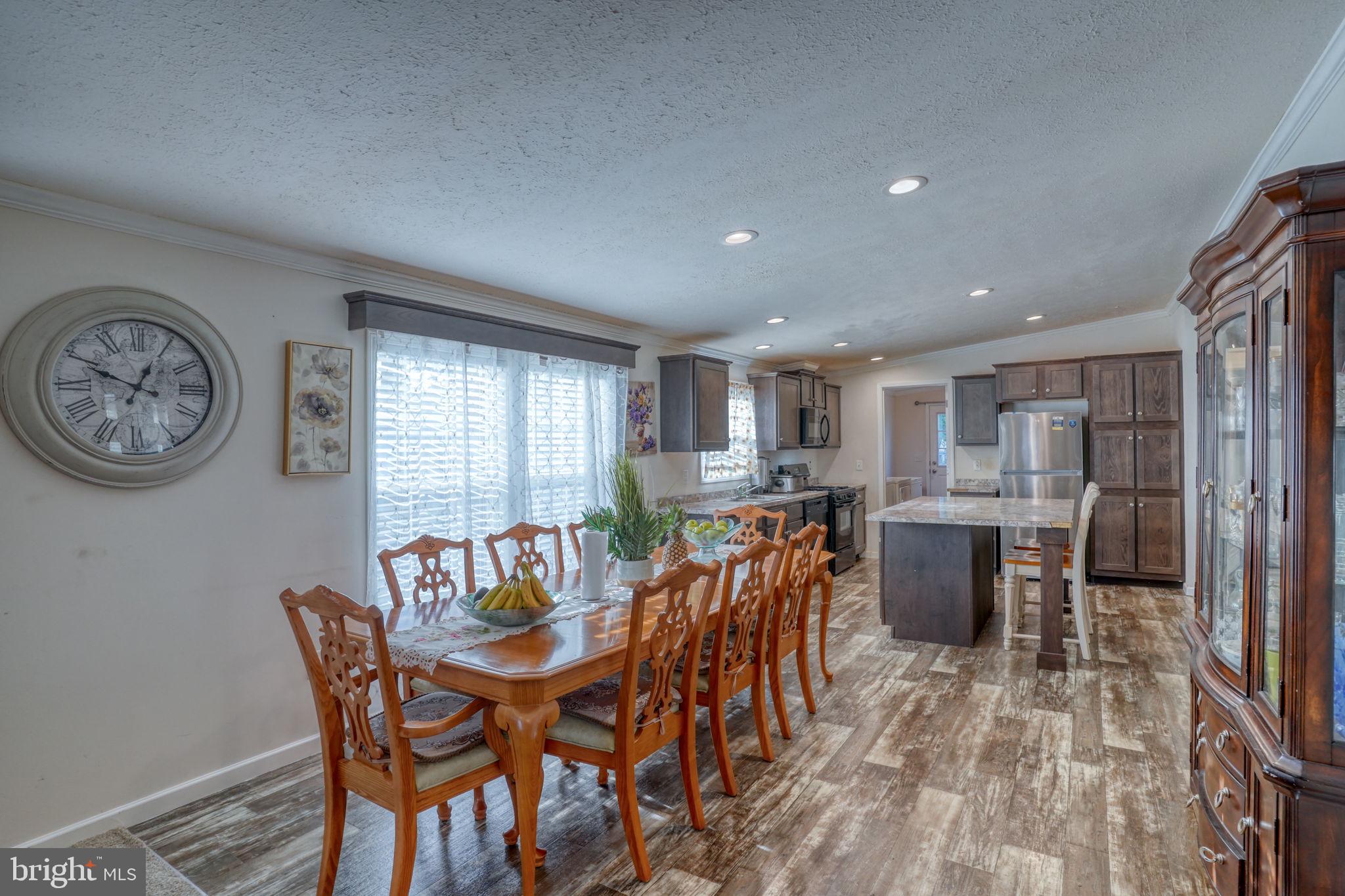 413 4th Street Frederica, DE 19946 - Photo 10 of 31 a view of a dining room with furniture window and wooden floor