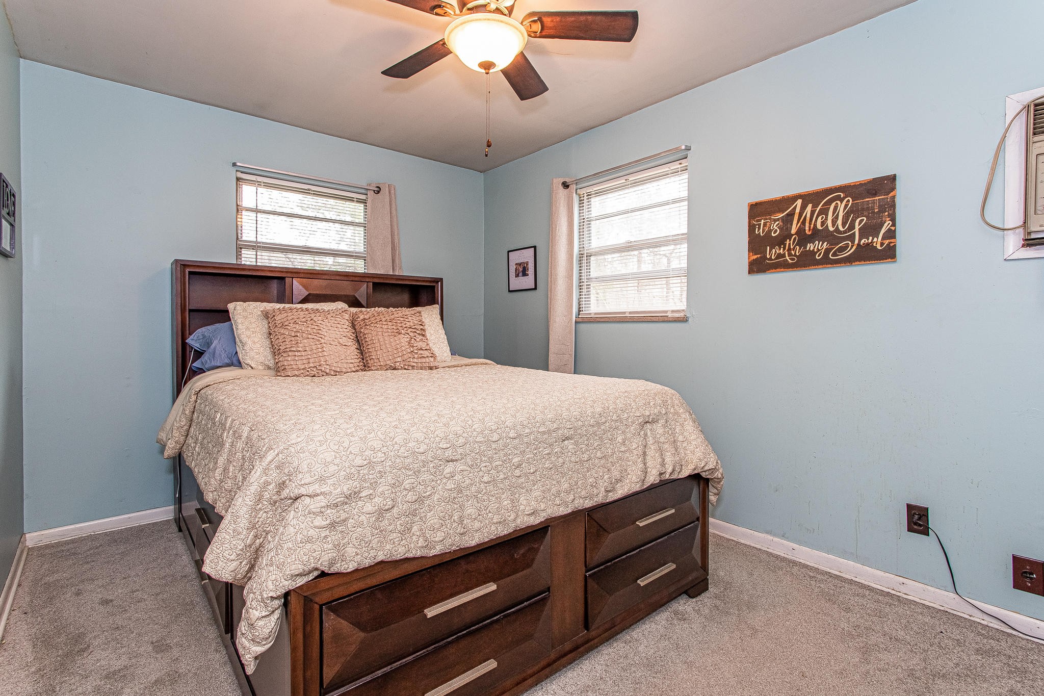 1101 Smith School Road Kodak, TN 37764 - Photo 16 of 23 a bed sitting in a bedroom next to a window