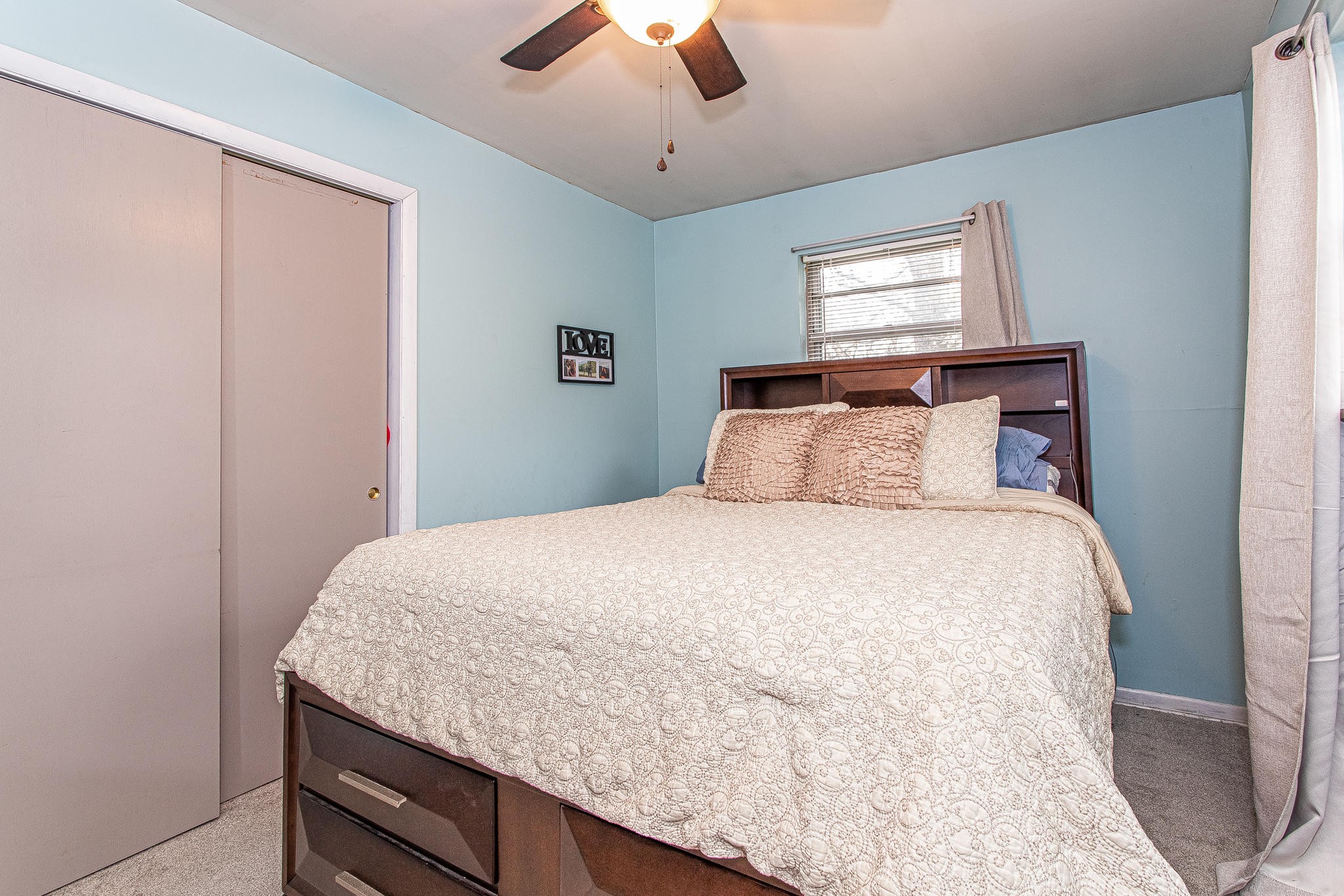 1101 Smith School Road Kodak, TN 37764 - Photo 17 of 23 a bedroom with a bed and window