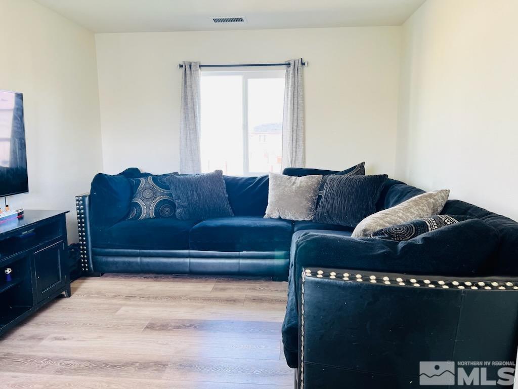 8908 Quail Falls Drive Reno, NV 89506 - Photo 11 of 17 a living room with furniture and a couch