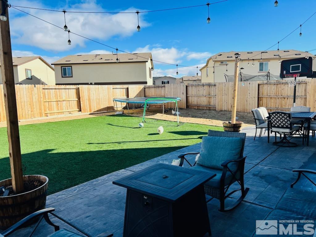 8908 Quail Falls Drive Reno, NV 89506 - Photo 15 of 17 a view of a chairs and table in the patio
