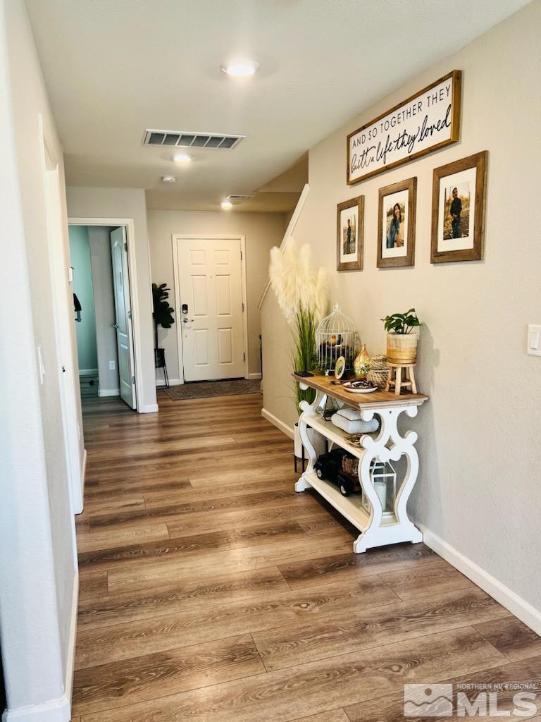 8908 Quail Falls Drive Reno, NV 89506 - Photo 3 of 17 a living room with furniture and a table