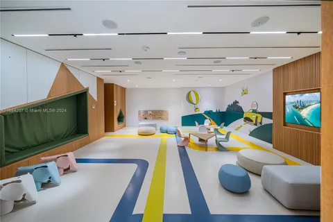 a view of room with gym equipment