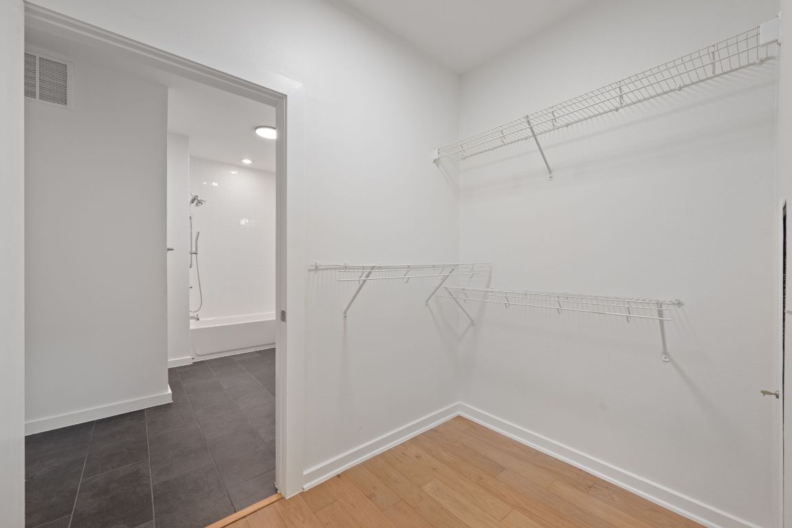 2505 Thornton Road, Unit 3103 Austin, TX 78704 - Photo 13 of 29 a view of a room with racks on the wall