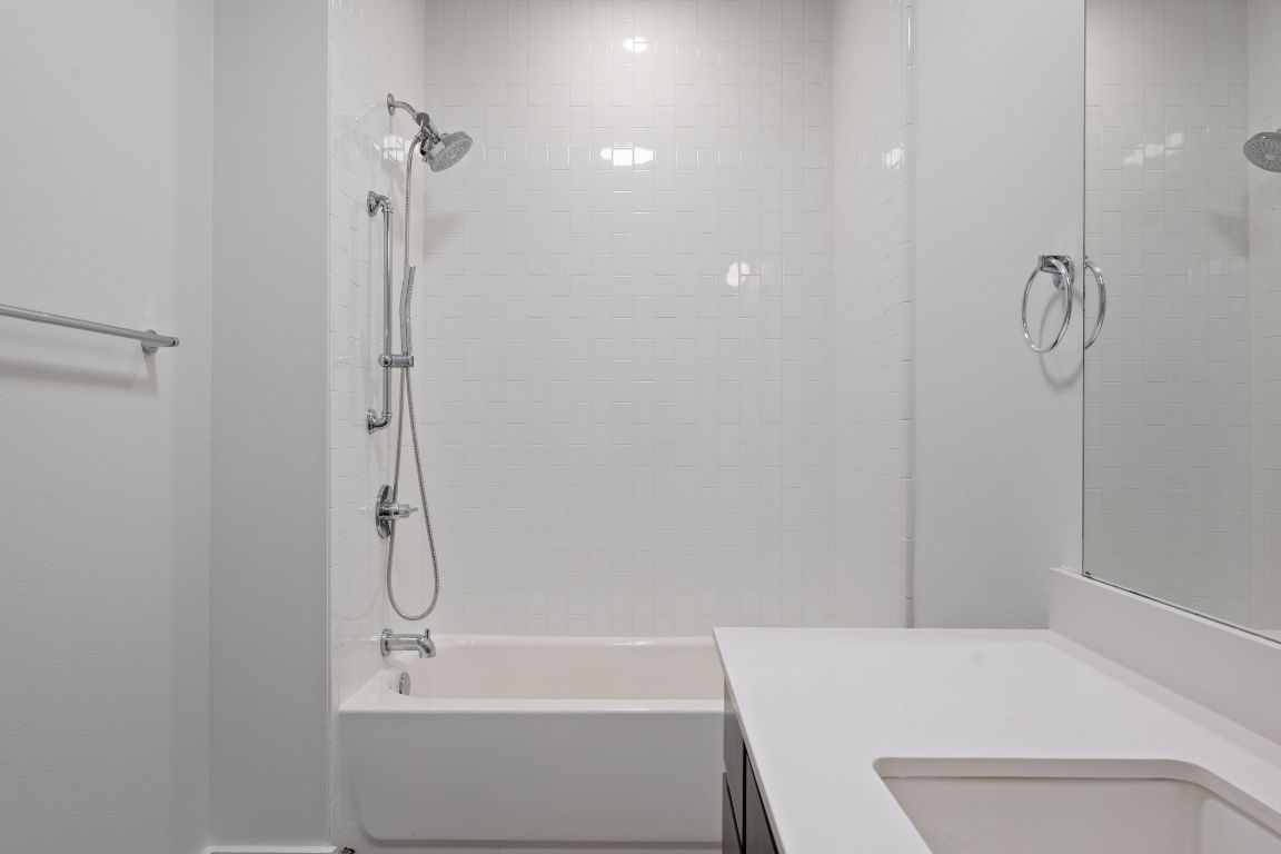 2505 Thornton Road, Unit 3103 Austin, TX 78704 - Photo 15 of 29 a bathroom with a bathtub and shower