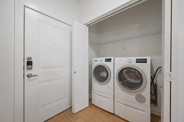 a utility room with dryer and washer