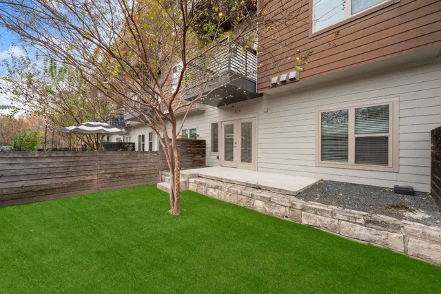 a house with trees in front of it