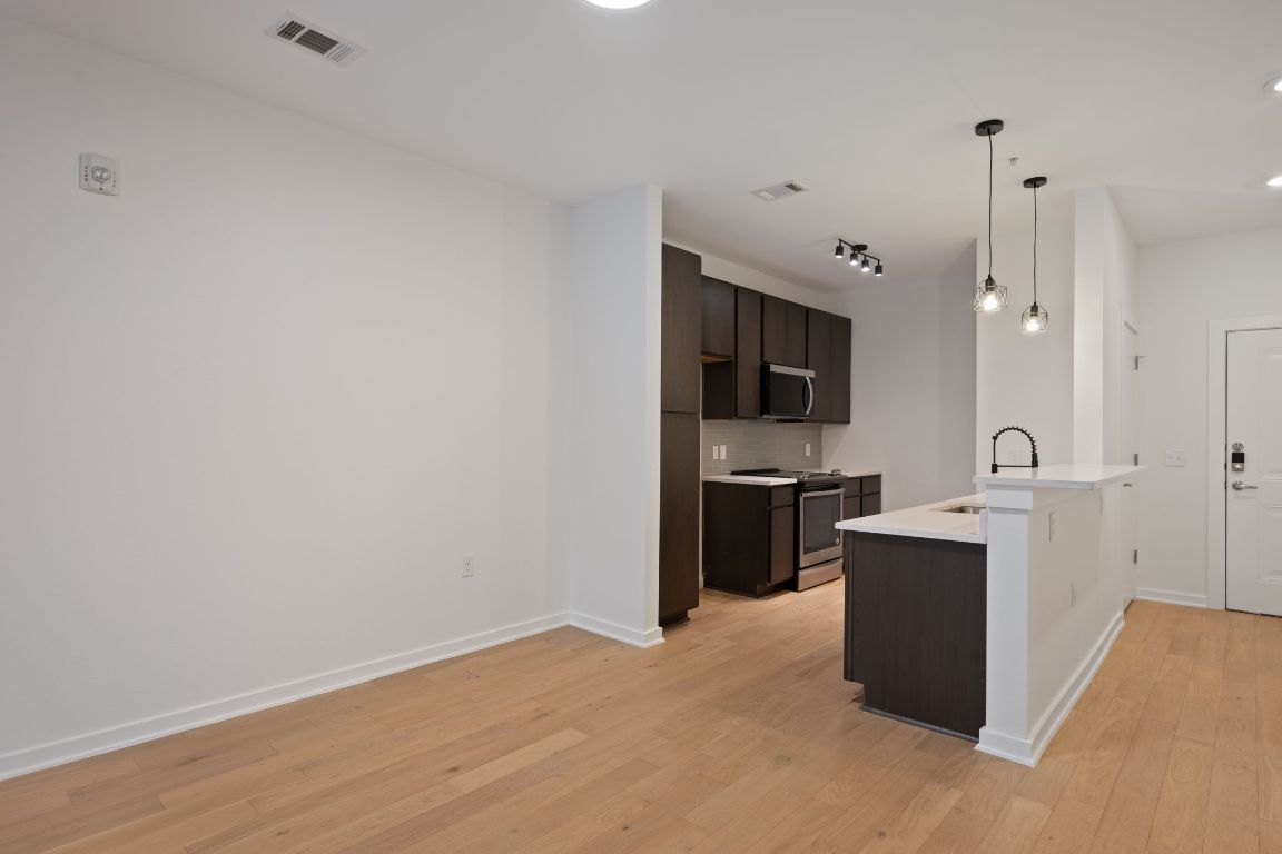 2505 Thornton Road, Unit 3103 Austin, TX 78704 - Photo 8 of 29 a view of a kitchen with a sink
