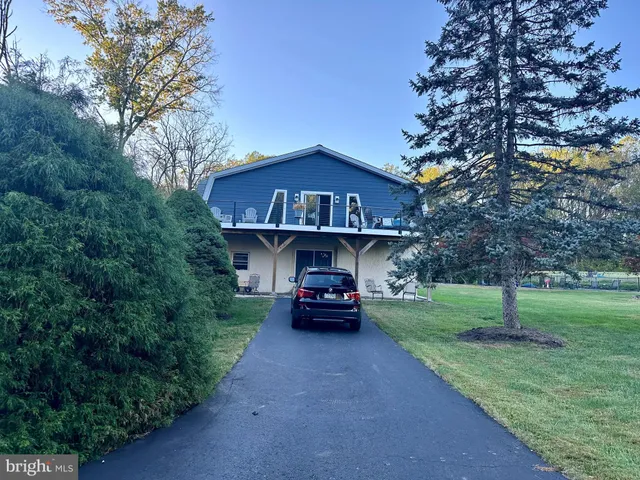 a view of deck with wooden floor and seating space