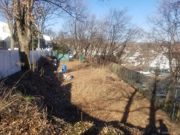an aerial view of a house with parking space