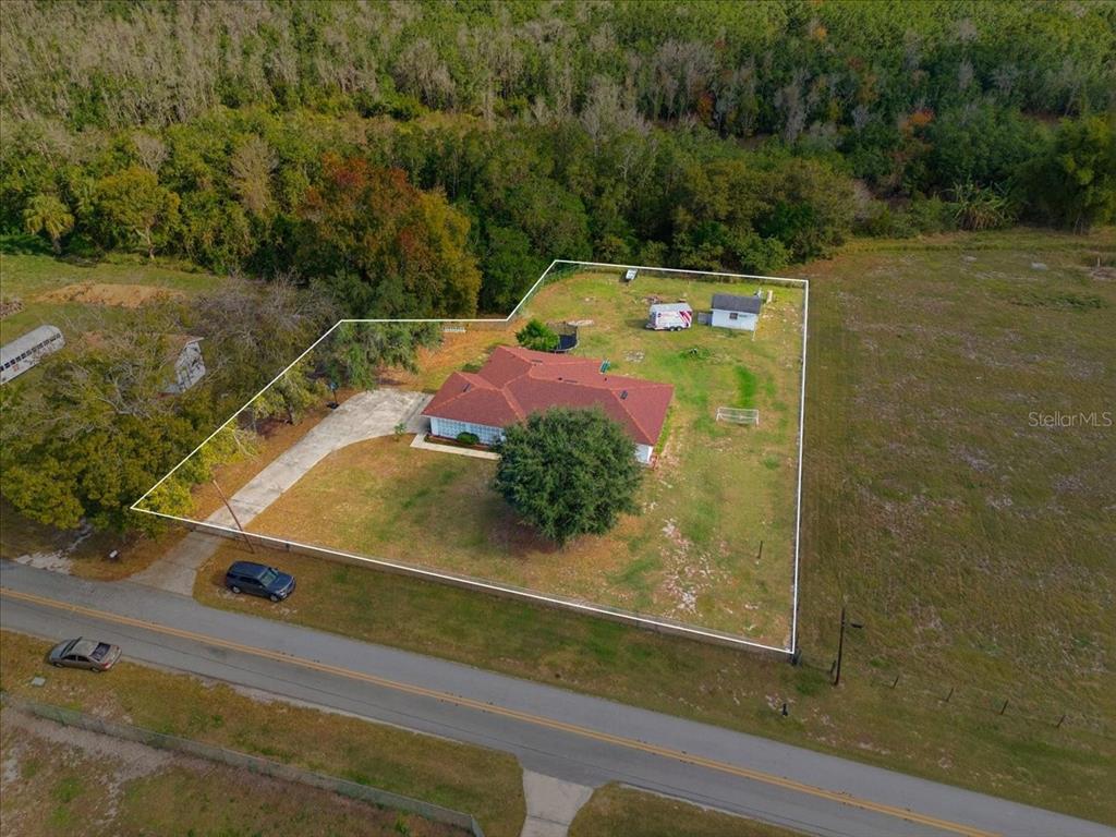 518 West Lake Wales Road North Lake Wales, FL 33859 - Photo 2 of 28 a view of a small yard