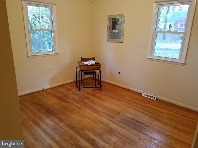 1628 Colony Road Pasadena, MD 21122 - Photo 12 of 29 3rd bedroom with hardwood floors