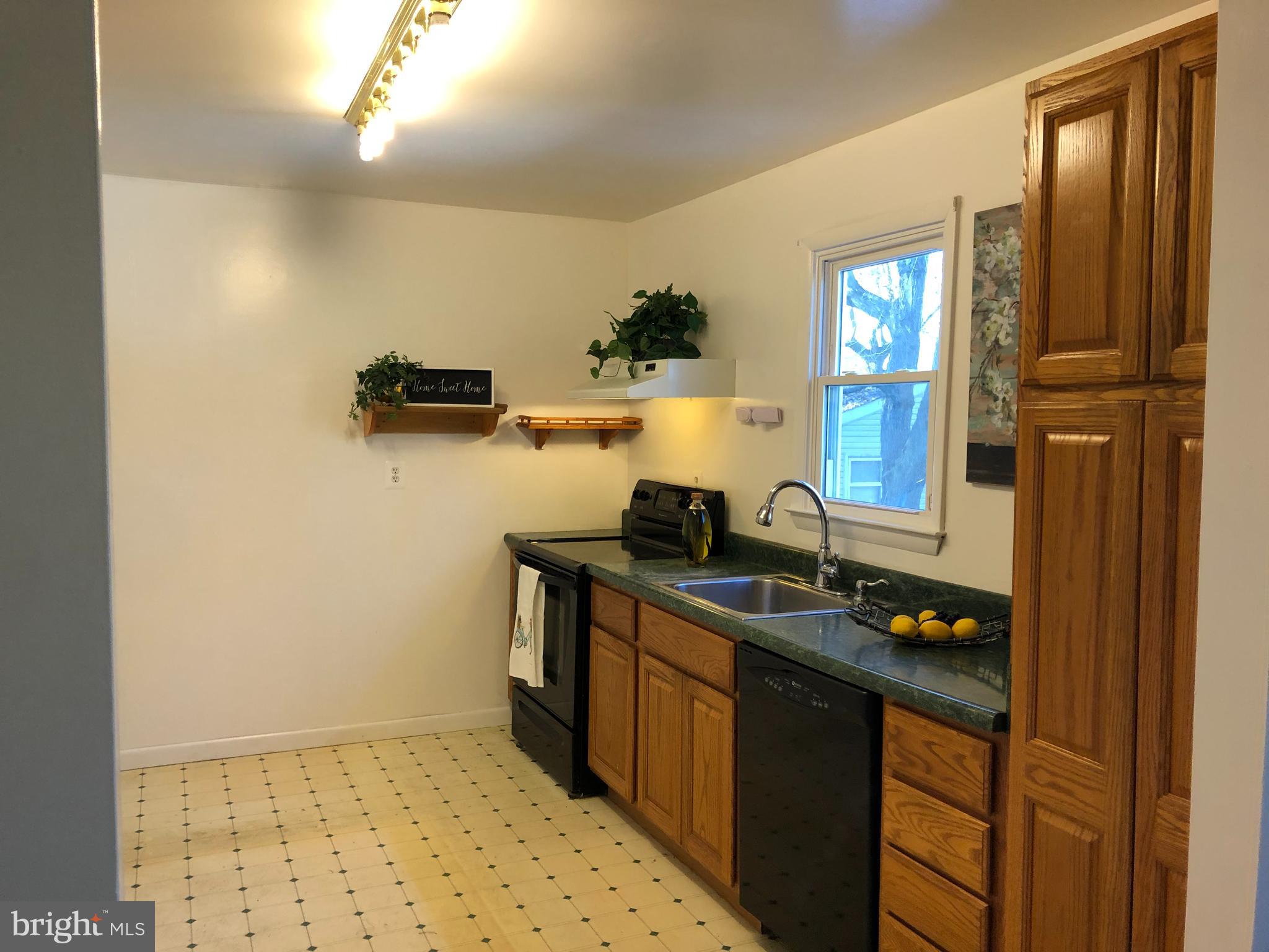 1628 Colony Road Pasadena, MD 21122 - Photo 7 of 29 Large Kitchen w/room for a table or more cabinets!