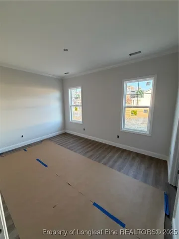 a view of an empty room and window