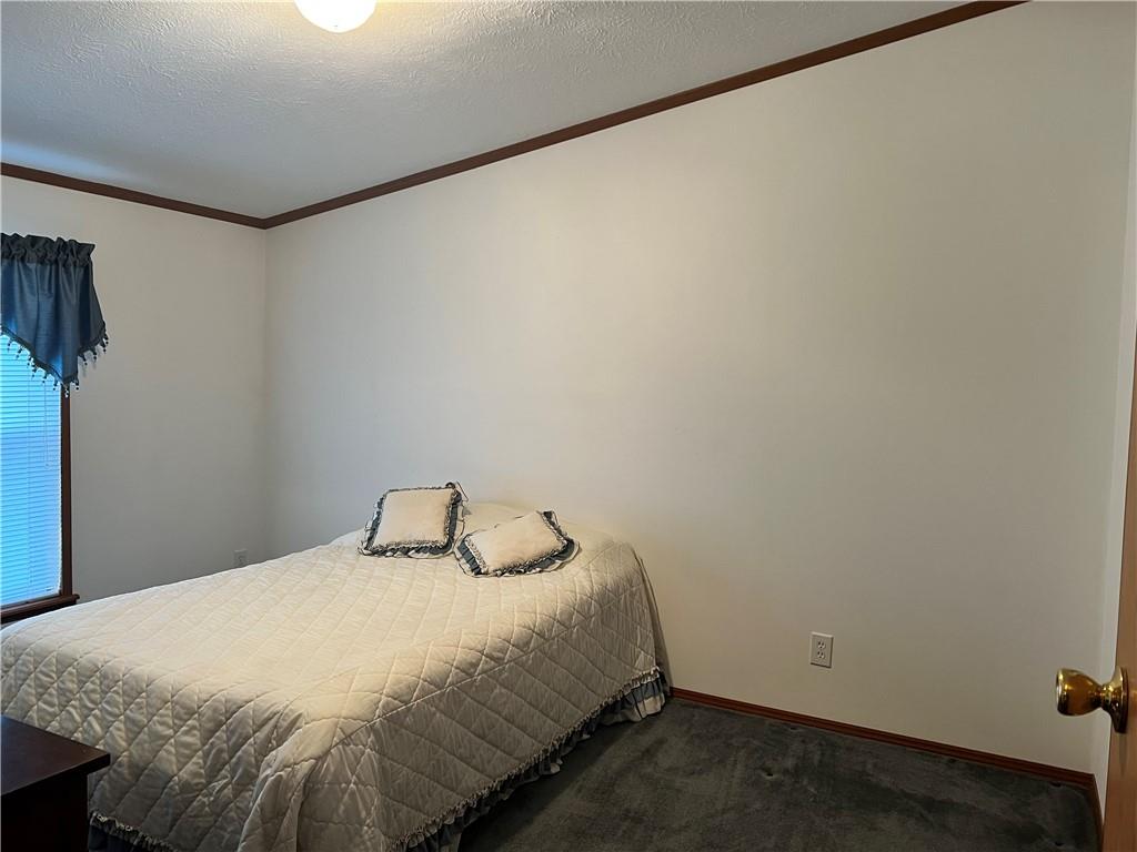 945 Old Princeton Road New Castle, PA 16101 - Photo 8 of 12 a bedroom with a bed and a window