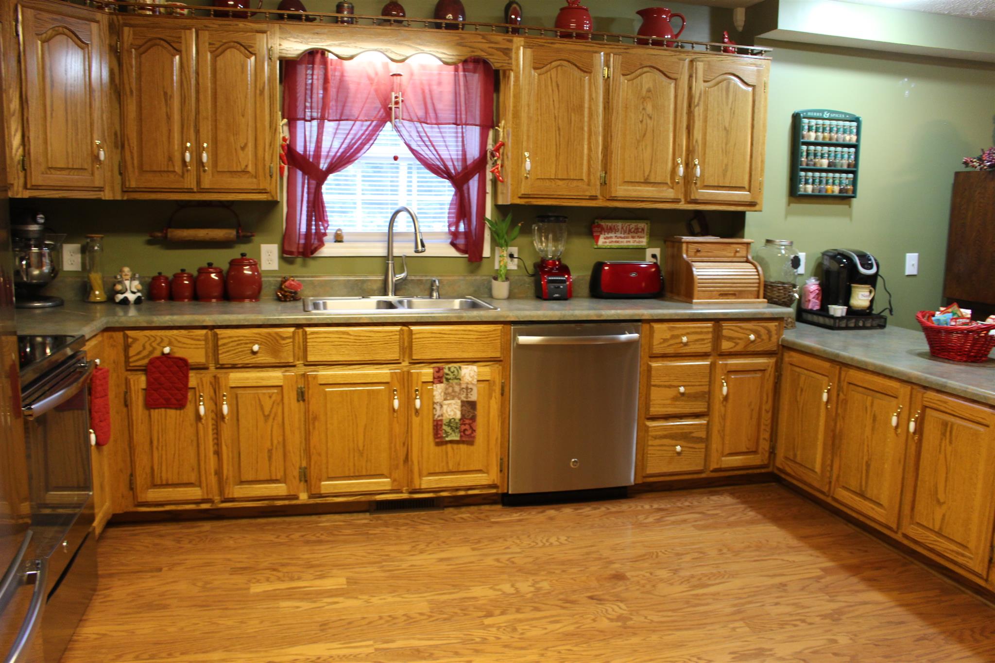 536 Strawberry Ridge Manchester, TN 37355 - Photo 9 of 30 a kitchen with stainless steel appliances granite countertop a sink window and cabinets