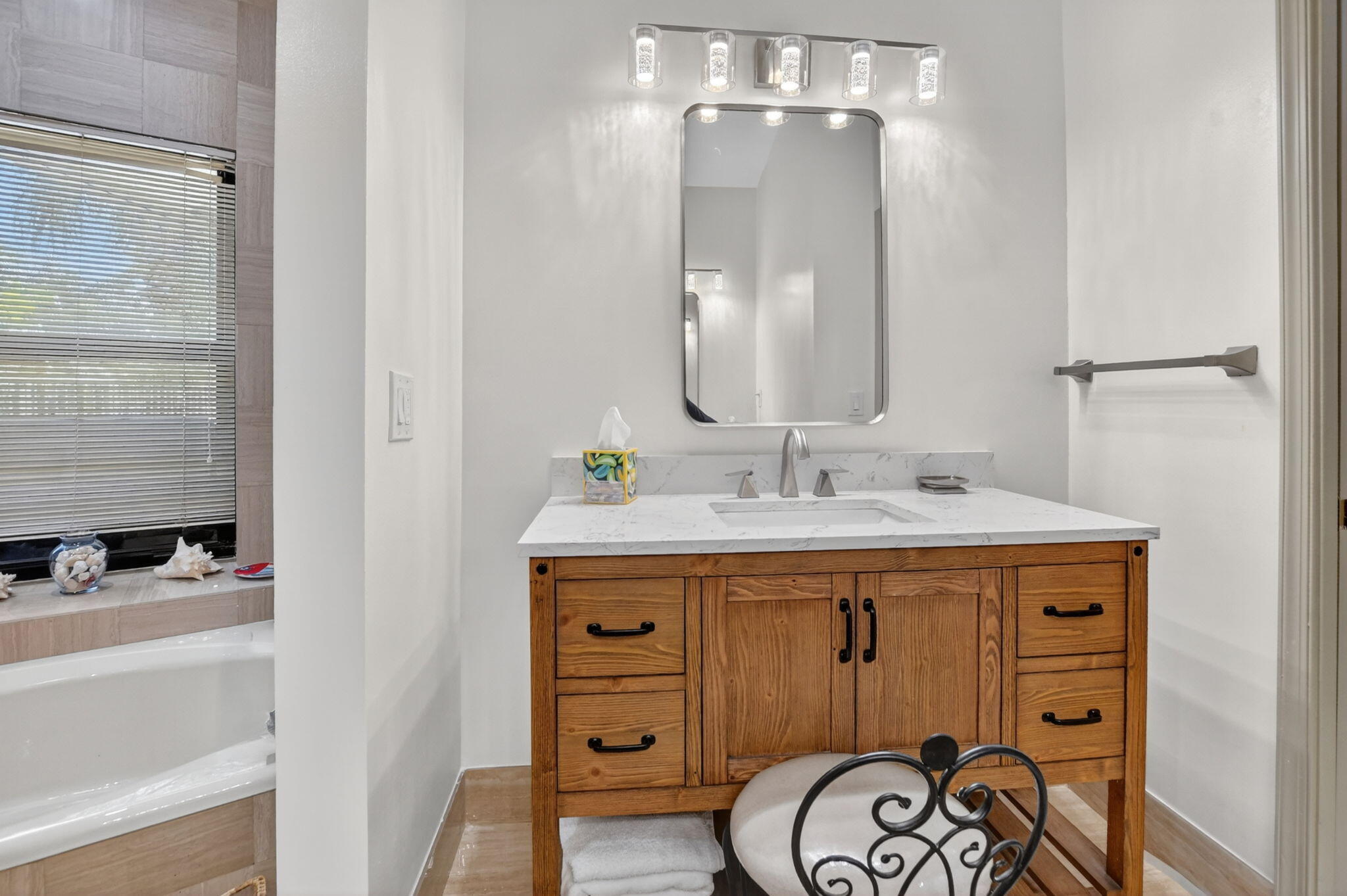 22519 Esplanada Circle, Unit W Boca Raton, FL 33433 - Photo 33 of 57 a bathroom with a sink and a mirror