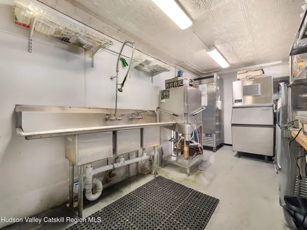 a kitchen with stainless steel appliances lots of counter top space