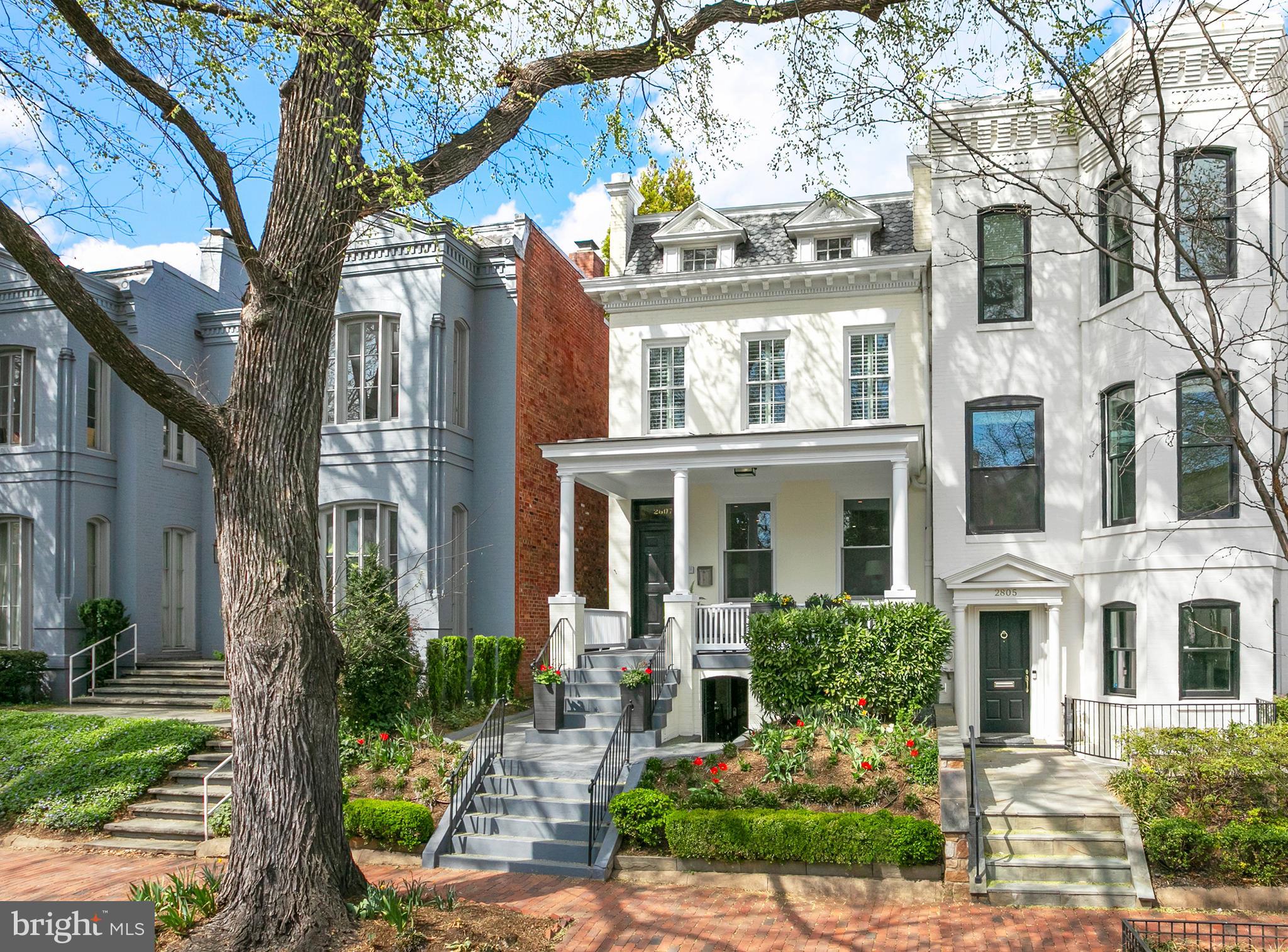 2807 Q Street Northwest Washington, DC 20007 - Photo 1 of 34 a front view of a residential houses with yard and green space