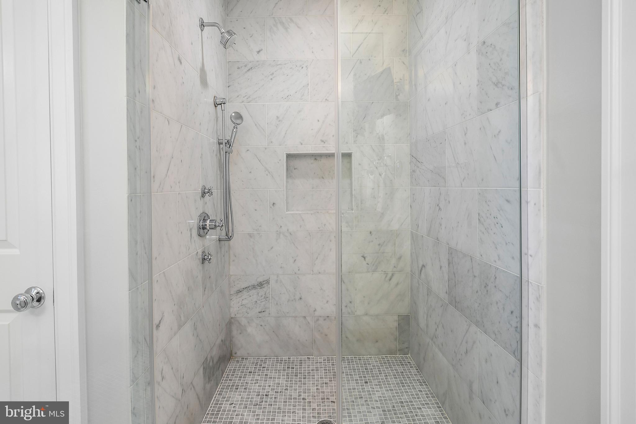 2807 Q Street Northwest Washington, DC 20007 - Photo 17 of 34 a bathroom with a shower