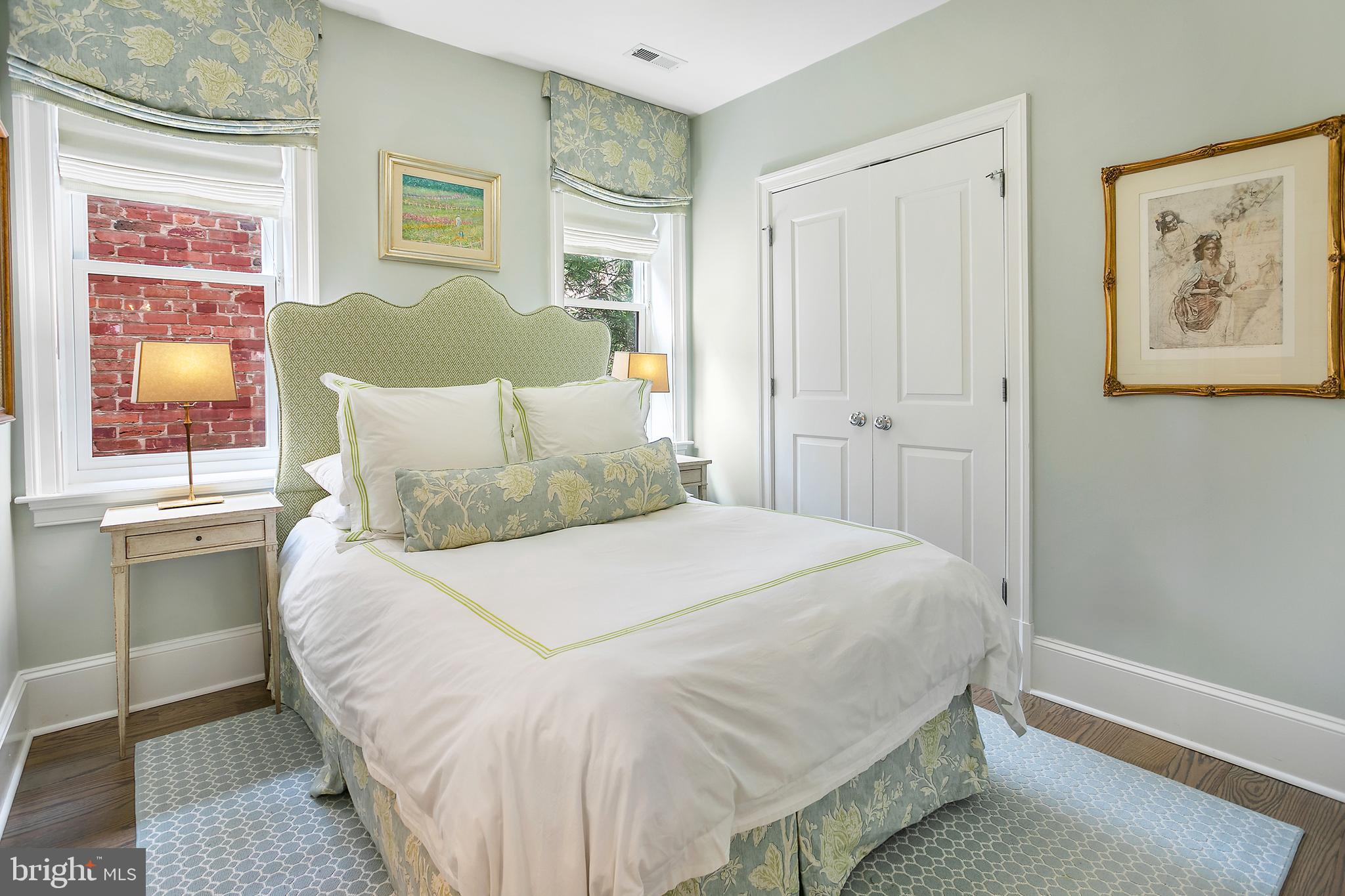 2807 Q Street Northwest Washington, DC 20007 - Photo 20 of 34 a bedroom with a bed and a window