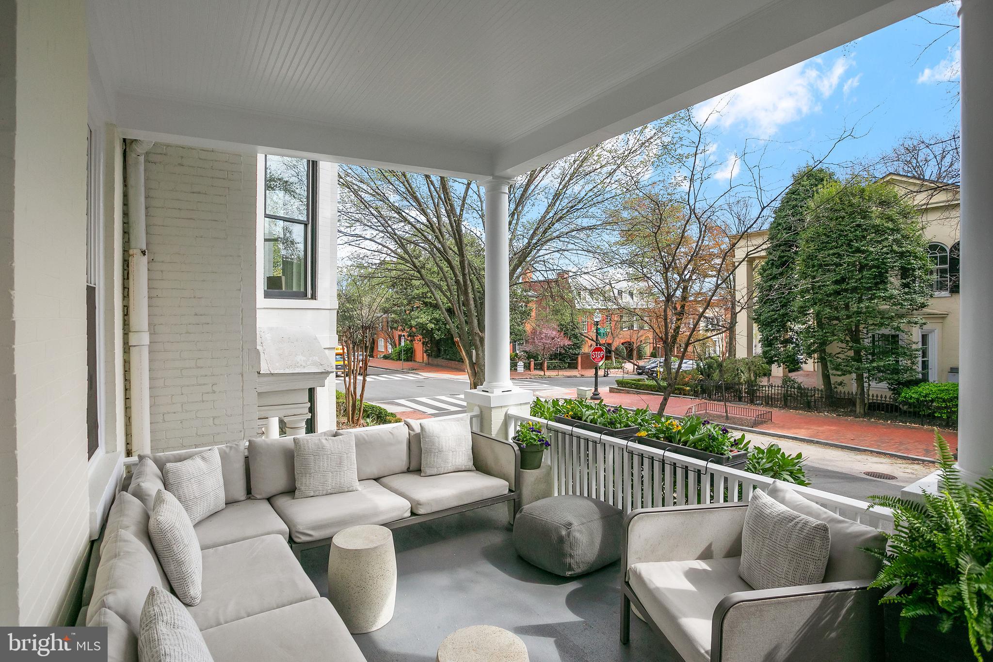 2807 Q Street Northwest Washington, DC 20007 - Photo 2 of 34 a living room with patio furniture and garden