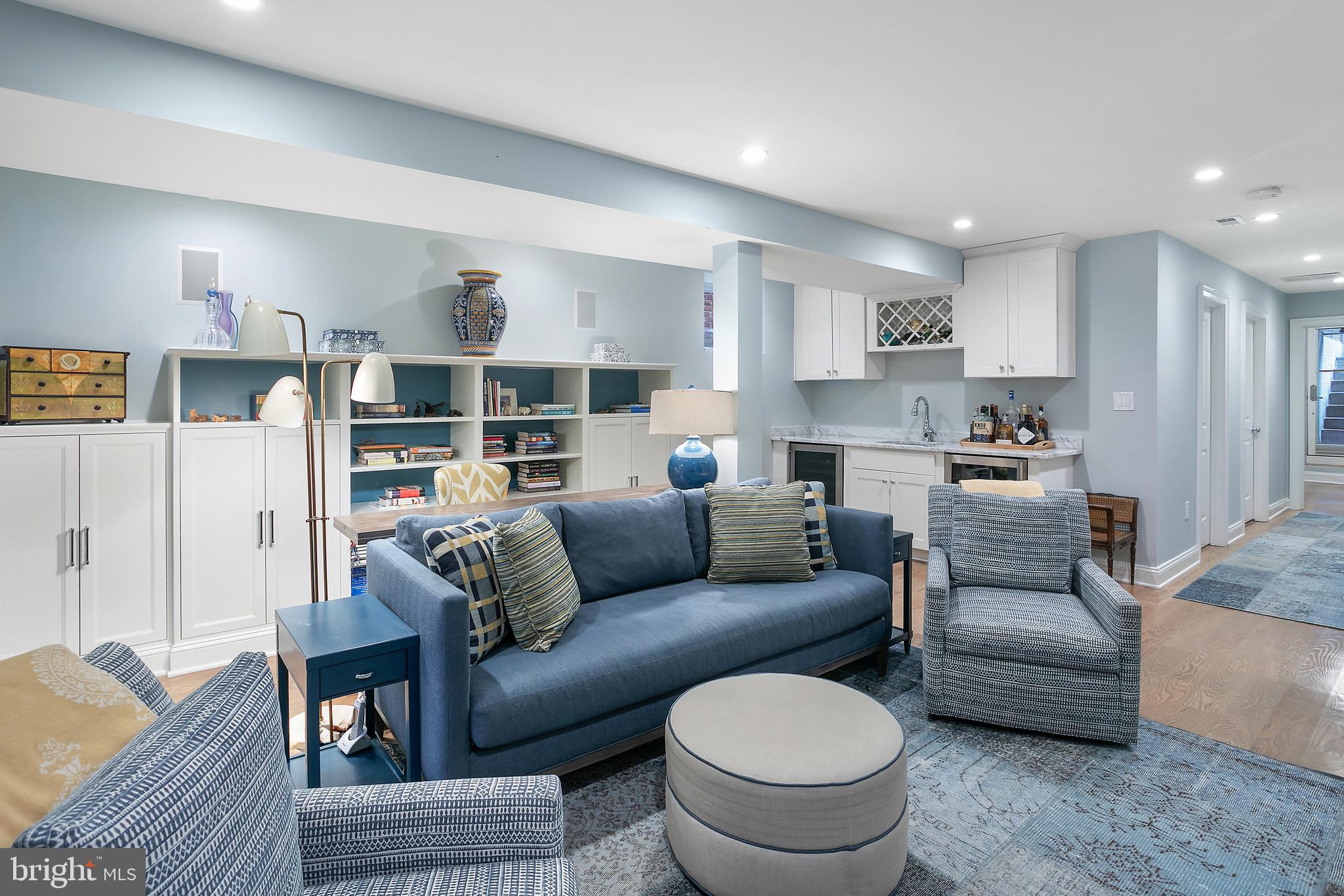 2807 Q Street Northwest Washington, DC 20007 - Photo 26 of 34 a living room with furniture and a couch