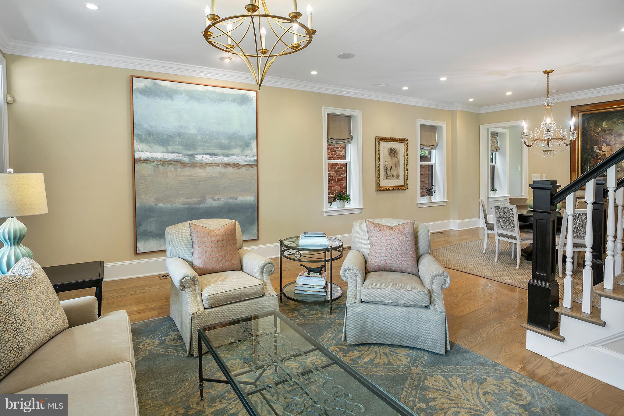 2807 Q Street Northwest Washington, DC 20007 - Photo 5 of 34 a living room with furniture a flat screen tv and a large window