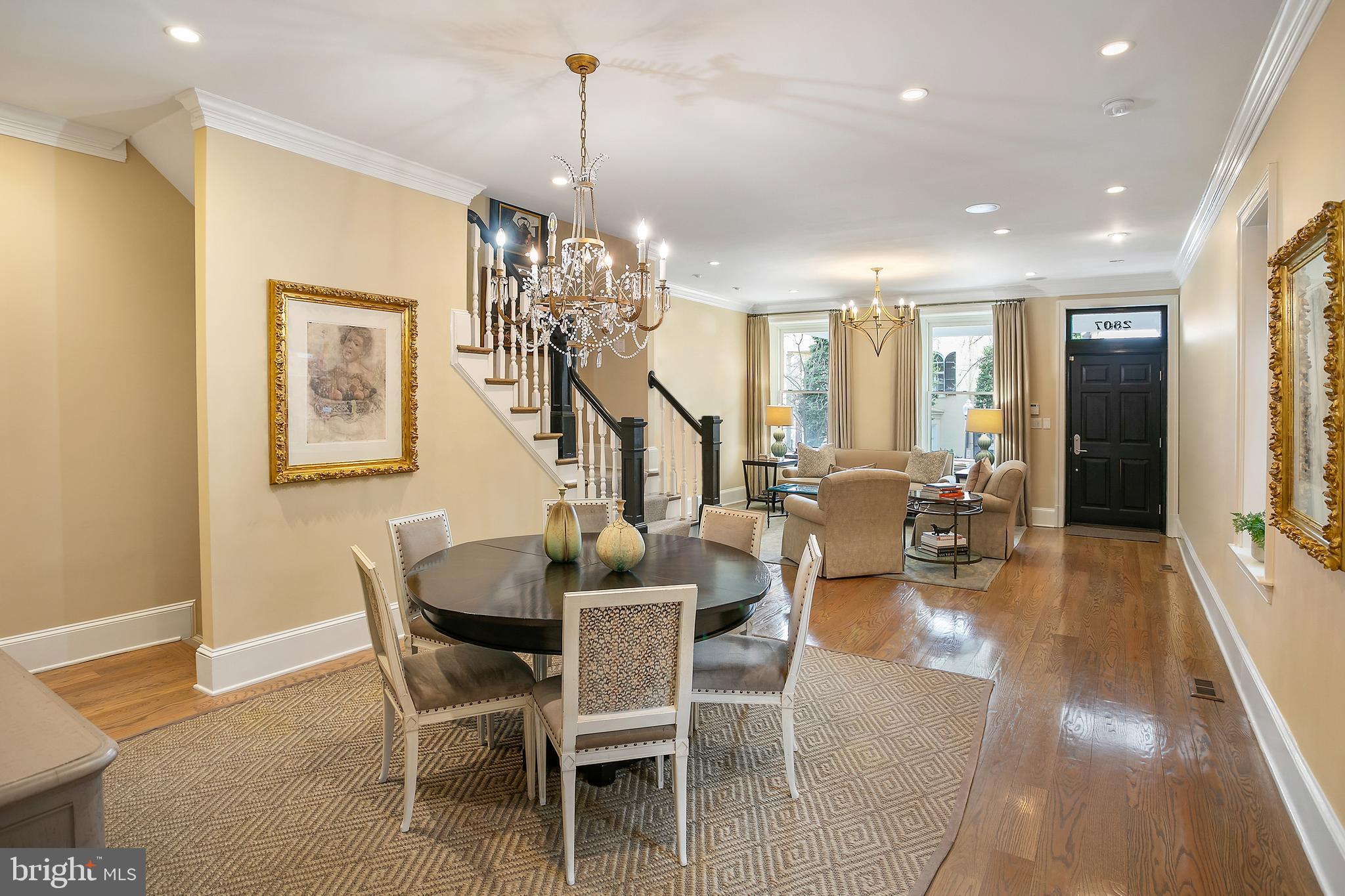 2807 Q Street Northwest Washington, DC 20007 - Photo 7 of 34 a view of a dining room with furniture a chandelier and wooden floor