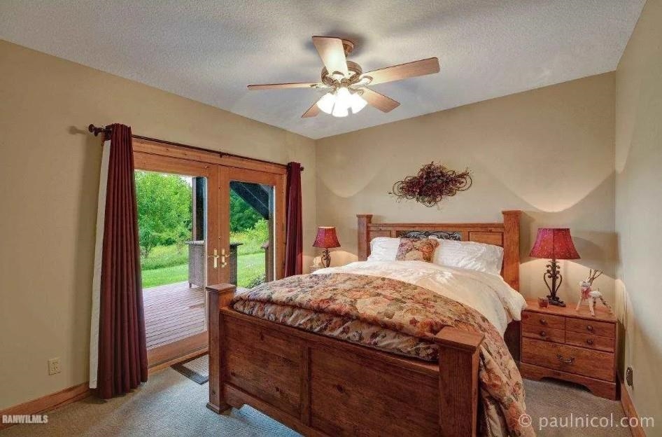 2287 West Hanover Road Hanover, IL 61041 - Photo 15 of 38 a bedroom with a bed and a window